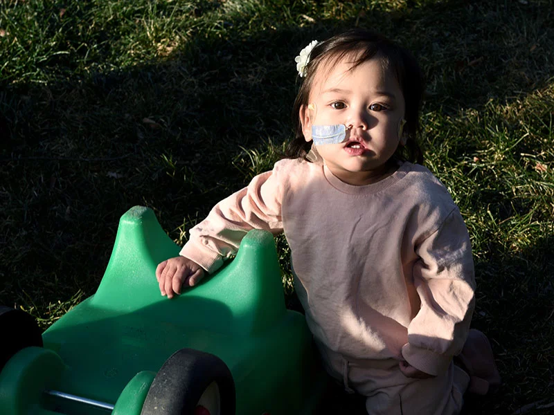 For now, Summer needs a nasogastric tube for daily nutrition. But she is working with therapists, and her parents are hopeful that her development will soon catch up with her brother, Grayson. Photo by Sonya Doctorian, UCHealth.