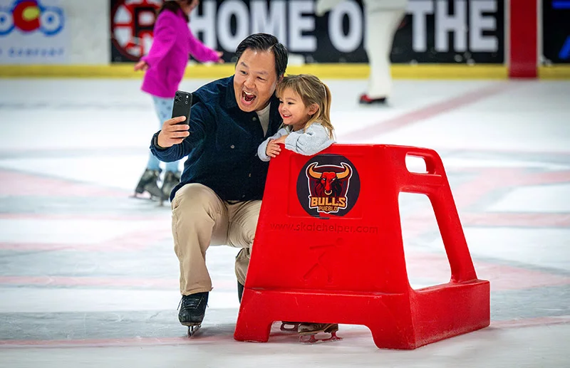 Lee takes a selfie with daughter Collins, during her first time on ice skates. Photo by Mike Sweeney, for UCHealth.