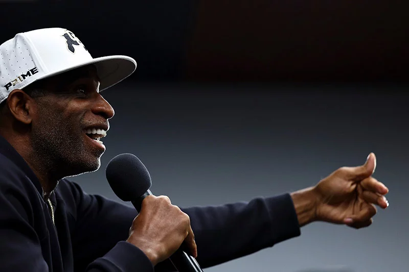 University of Colorado head football coach Deion “Coach Prime” Sanders speaks at the “prime Perspective” event, which focused on men over 40 seeking medical care when needed and improve their health. Along with a panel discussion, attendees were offered health screenings. Photos by Clarkson Creative Photography, for UCHealth.