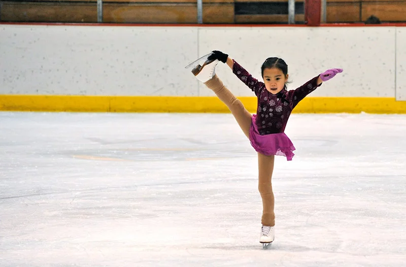 Ellie Kam competing as a young child. Photo courtesy of Dr. Benjamin Kam.