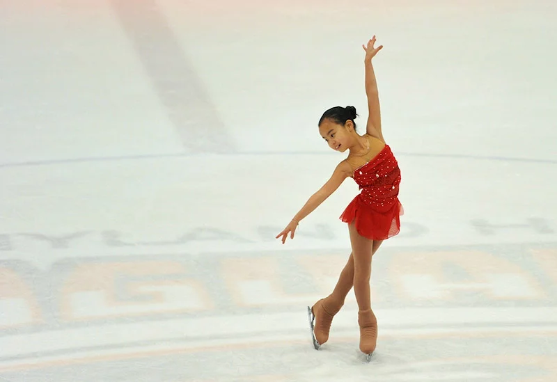 Ellie Kam started ice skating at age 4 and soon was competing as a singles skater. She transitioned to pairs skating when she was a teen and now is ranked 5th in the world with her partner, Danny O'Shea. Photo courtesy of Dr. Benjamin Kam.
