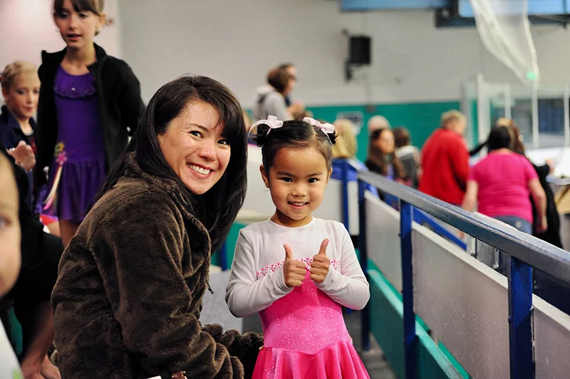 Ellie Kam with her mother, Mako Kam. Ellie's mom always encouraged Ellie and her two older brothers to "show up" when they decided to participate in activities. Ellie followed her brothers onto the ice and stuck with it. Her older brothers moved on to other activities and now serve in the U.S. Air Force, like their father did for more than 23 years. Photo courtesy of Dr. Benjamin Kam.