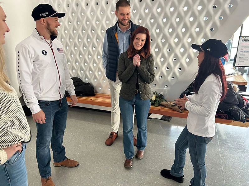 Dylan Ryder, center, with Danny O'Shea, left and Ellie Kam, right. Ryder is an operating room nurse who works with Ellie’s dad, and is a big fan of the Colorado figure skating duo. Photo by Katie McCrimmon, UCHealth.