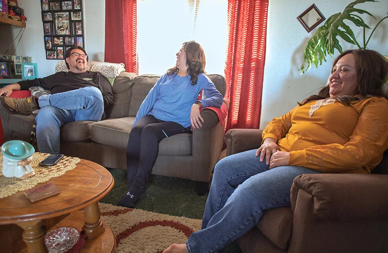 Home again after his heart transplant, Joseph shares an easy laugh with his mom and his sister. Joseph's great sense of humor made him a popular patient at UCHealth University of Colorado Hospital. But family members and hospital staffers all were eager to help Joseph return home with his new heart as soon as possible. Photo by Donovan Quintero, for UCHealth.
