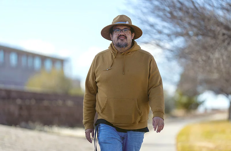 Joseph’s heart had been pumping at only 9 percent as he struggled to breathe and walk. His heart transplant at 35 restored his strength and gave him a chance to return to his life. Now that he feels much better, Joseph enjoys taking walks every day. Photo by Donovan Quintero, for UCHealth.