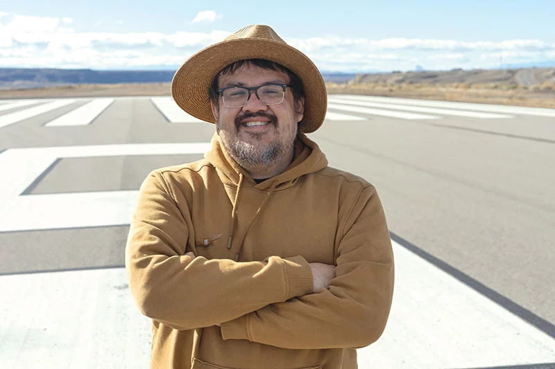 The runway in Farmington is where Joseph once guided travelers. Now, after his heart transplant at 35, it represents the moment he became the patient flown out as precious cargo to get lifesaving care in Colorado. Photo by Donovan Quintero, for UCHealth.