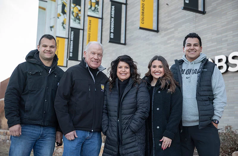 Now that he has recovered fully from his stroke, Mike relishes spending time with his family including his son, Michael Jr., left, his wife Marian, center, daughter Mia and her fiancé, Camden Raedel, right. Photo by Anslee Wolfe, for UCHealth.