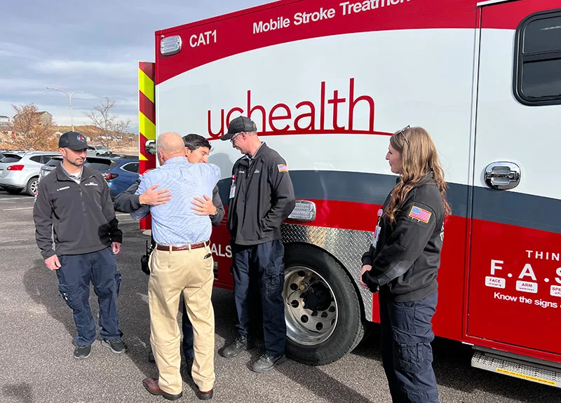 A few months after his stroke, Mike met team members from the mobile stroke unit who helped save his life. Within minutes of suffering a stroke at his business, Mike was receiving help from experts who consulted with a neurologist then gave him a clot-busting medication at the scene. They then rushed him to the hospital, where Mike received more care. “You lose millions of brain cells every minute when you’re having a stroke,” said Ashleigh Wright, right, charge nurse for the mobile stroke unit in Colorado Springs. “You have the best outcomes if you can get treatment within 60 minutes." Photo by Joanna Bean, UCHealth.