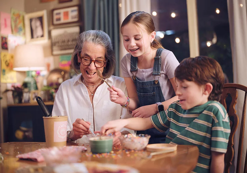 Peggy loves spending time with her grandchildren, whether they are enjoying ice cream sundaes during regular Sunday dinners or are doing craft projects together. Thanks to excellent care, Peggy has lived 13 years after receiving a scary diagnosis of stage 4 colon cancer. Photo: UCHealth.
