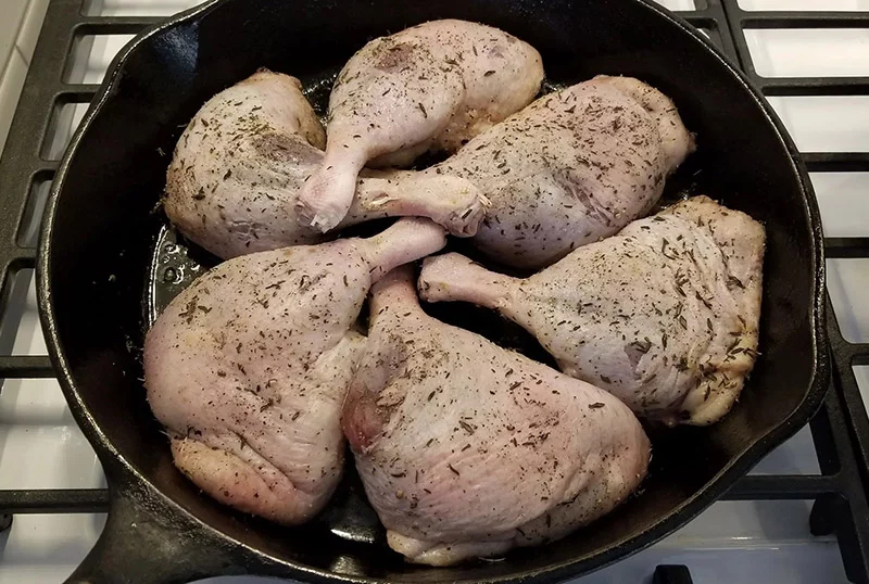 Duck legs and thighs ready for roasting for confit. Photo by Bill St. John, for UCHealth.