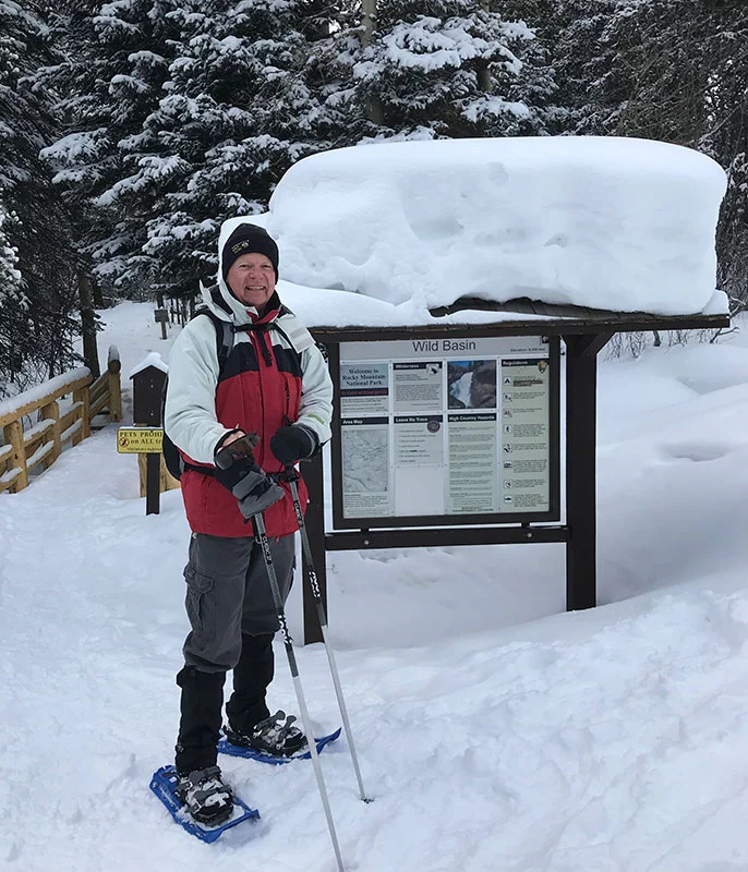 Phil Sheridan, out snowshoeing, is an active outdoorsman and an advocate for regular skin cancer checks. Photo courtesy of Phil Sheridan. 