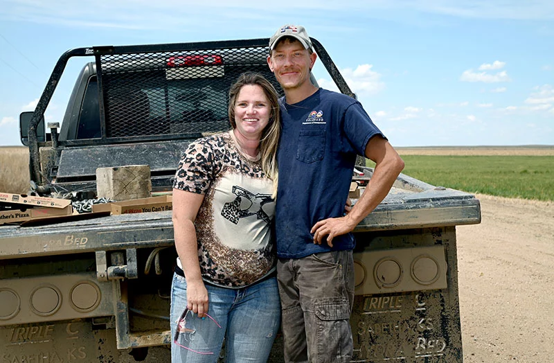 Along with running their ranch and farm, Jade is a teacher at an online charter high school, and Branden works for the Colorado Department of Transportation. Jade went back to work weeks after Beauden was born to help her students finish their work for the semester. Photo by Sonya Doctorian.