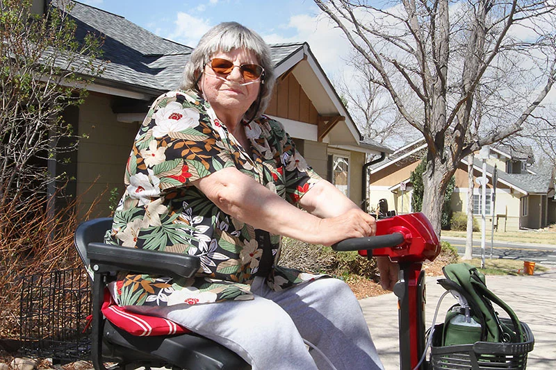 Ute Willmore had to use a wheelchair while recovering from hip surgery. Coordinated care and community support helped ensure her needs were met during rehabilitation. Photo by Joel Blocker, for UCHealth.