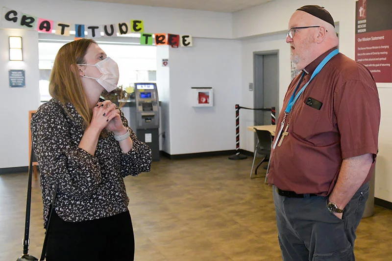 JP Hall talks to Dr. Meghan O’Leary-Kelly, a family medicine doctor who is doing a fellowship in hospice and palliative care at University of Colorado Anschutz School of Medicine. She visited Rocky Mountain Refuge and called their work "a gift." Photo by Cyrus McCrimmon, for UCHealth.
