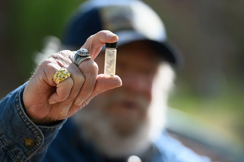 Golden loves gold prospecting, but it’s not easy work. After serious health challenges, pulmonary rehabilitation helped him get back to panning. Photo by Mark Reis for UCHealth.