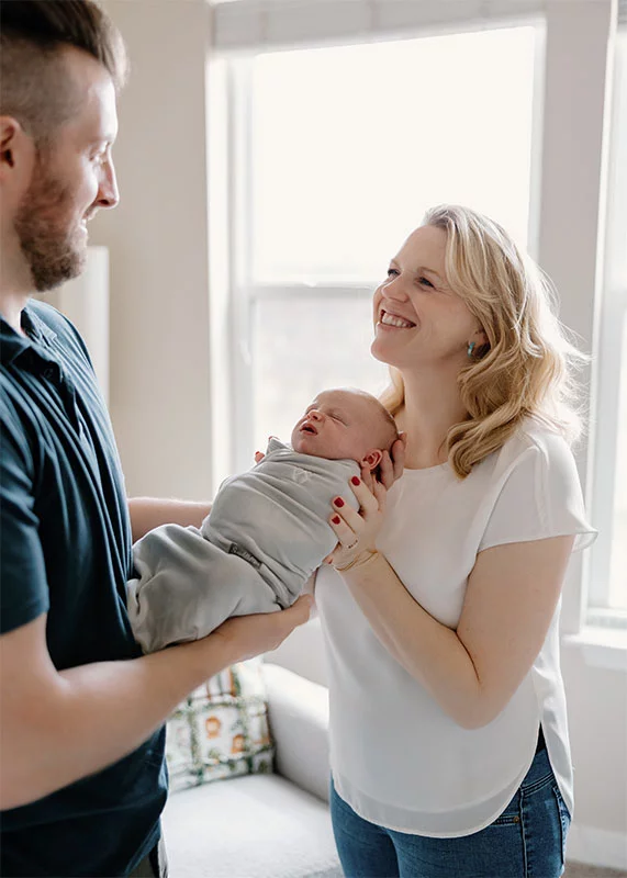 Kayla and Zac were thrilled to welcome their son, Locke. Kayla struggled with infertility but was able to have her son even as she endured breast cancer treatments. Photo by Olivia McGuire, courtesy of Kayla Calkin.