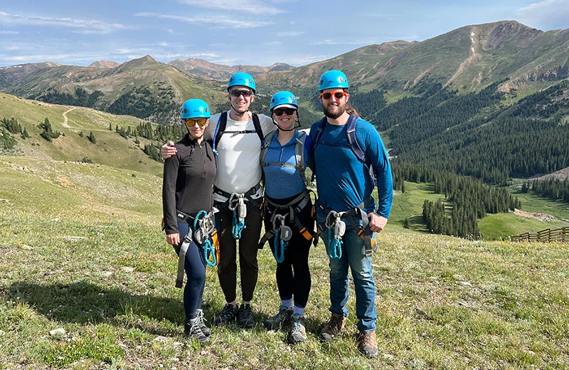Kayla, second from right, enjoyed doing a via ferrata course at Arapahoe Basin while undergoing cancer treatments. She enjoyed the adventure with her partner, Zac, right, and her brother, Chris second from left. Photo courtesy of Kayla Calkin.