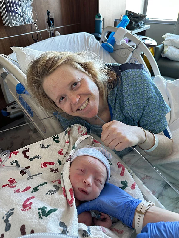 Kayla with her newborn, Locke. Kayla was thrilled to be able to have her son, even as she endured cancer treatments. Photo courtesy of Kayla Calkin.