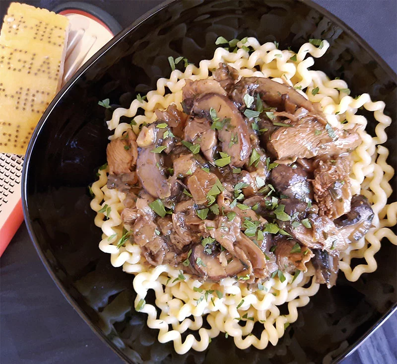 A simple mushroom ragout made of several sorts of mushrooms, including homegrown pink oyster mushrooms. Photo by Bill St. John, for UCHealth