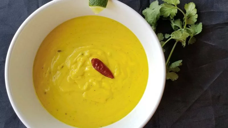 Kadhi, an Indian yogurt-based soup, gets sparks of flavor from the addition of mustard seeds. Photo by Bill St. John, for UCHealth