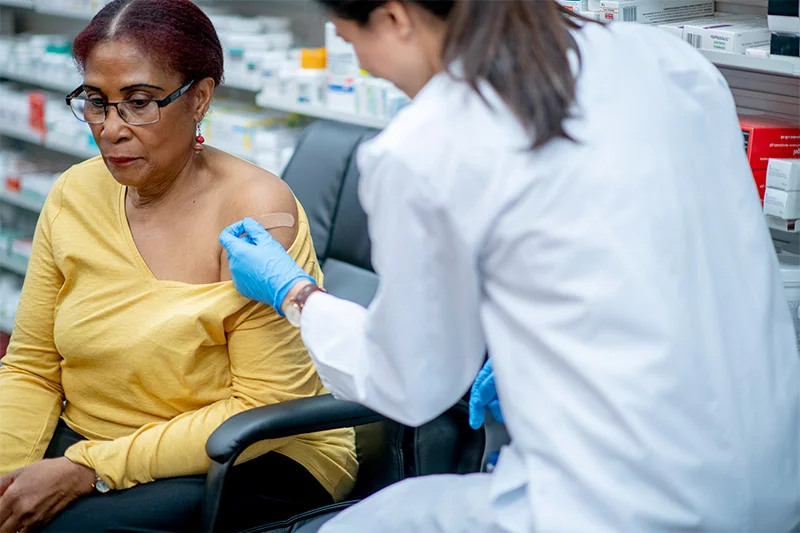 COVID-19 continues to mutate and spread, and a recent study of the 2025–26 COVID vaccine shows the vaccine reduced illnesses requiring medical care and hospitalization. Photo: Getty Images.