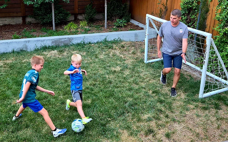 Dr. Jack Spittler is the Colorado Rapids' chief medical officer and enjoys playing soccer with his children, Luke, 9, left, and Josh, 7. Spittler and fellow medical experts have studied soccer injuries in hopes of keeping professional players healthier. Photo courtesy of Jack Spitter.