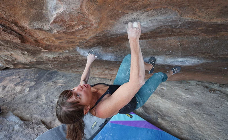 Melissa Strong bouldering at Hueco Tanks State Park and Historic Site in 2019. Photo by Adam Strong.