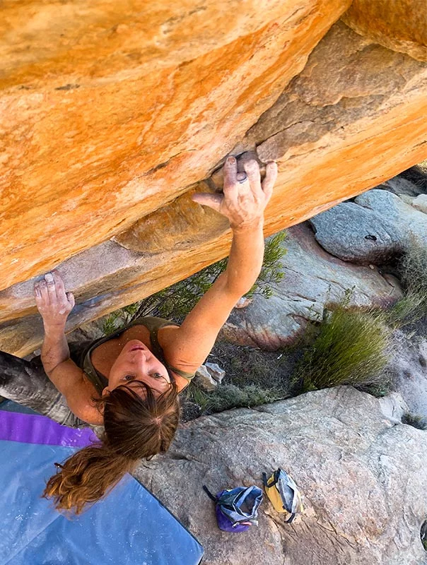 Melissa Strong climbs in Rock Lands, South Africa, in 2025. Photo by Adam Strong.