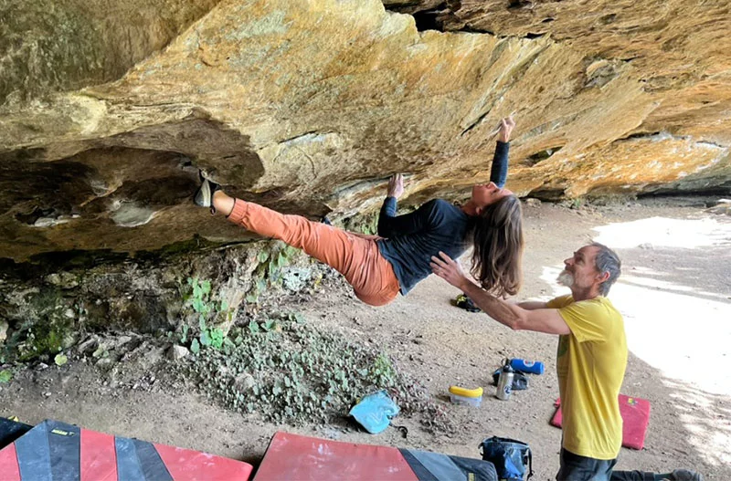 Melissa bouldering in "The Cove" in Kentucky, in October 2025. Photo by Layla Mamy, courtesy of Melissa Strong.