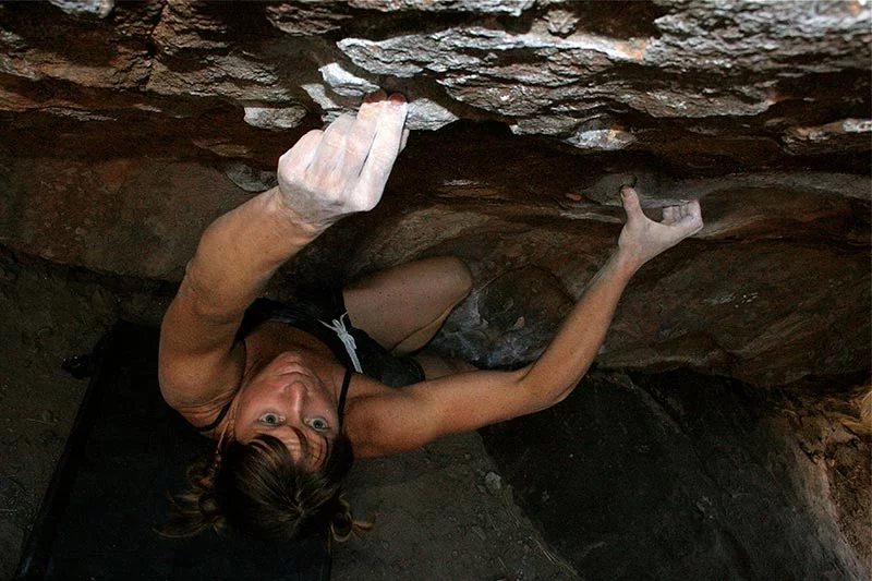 Melissa climbing at Hueco Tanks State Park and Historic Site. Photo by Adam Strong, courtesy of Melissa Strong.