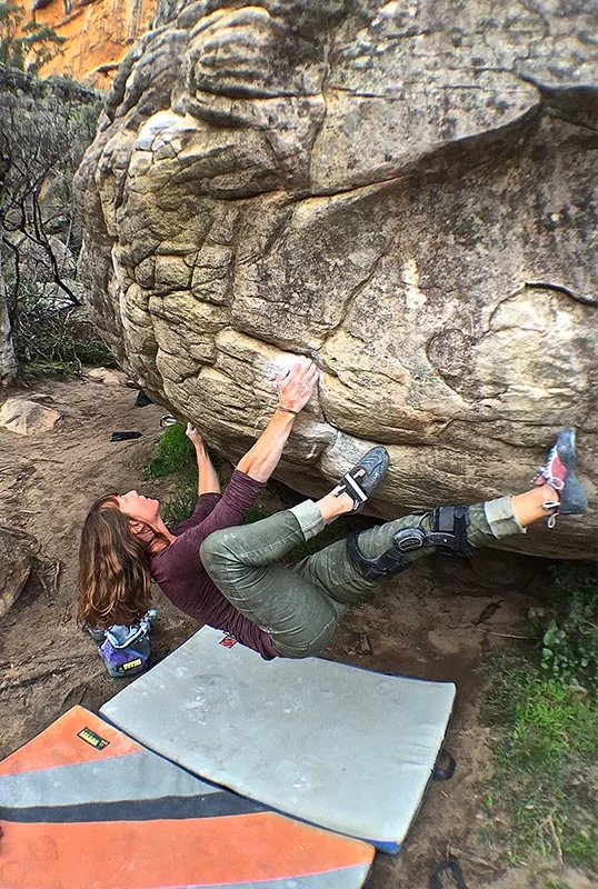 Melissa climbing in Australia in 2016, before her accident, but with a knee brace. Photo courtesy of Melissa Strong.