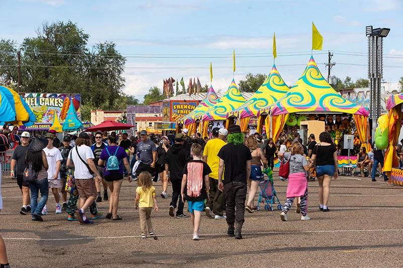 Fairgoers will find a number of exhibits that show off the best of Colorado, including the Colorado Proud Trail, which allows kids to gather and learn about Rocky Ford melons, Palisade peaches, Olathe sweet corn, Pueblo green chiles and more. Photo by Steve Bryant, courtesy of the Colorado State Fair.