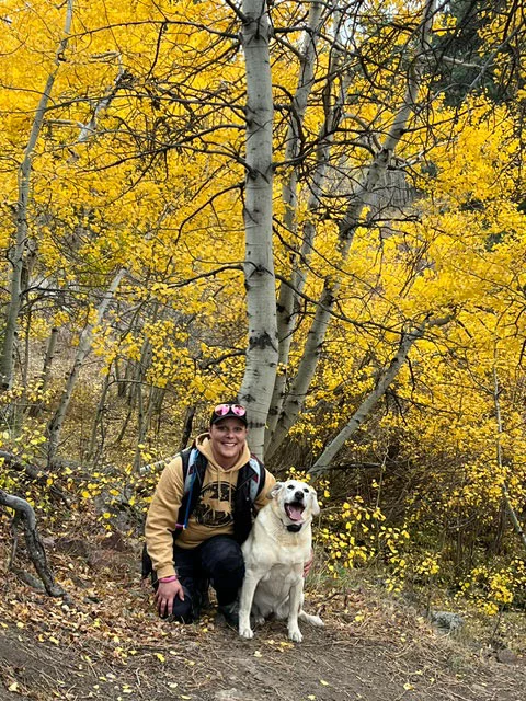 Karissa with her dog. For Karissa Goossen, time outdoors is more than recreation. “That was always my medicine, and that is the best medicine for me,” she said. Photo courtesy of Karissa Goossen. 