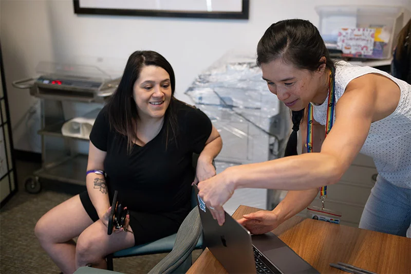 Dr. Vivian Jiang, right, and her team at UCHealth Family Medicine in Westminster offer group prenatal visits in the Denver area to make it easier for pregnant women to stay healthy and learn everything they need to know before giving birth. Photo by Mark Reis, for UCHealth.