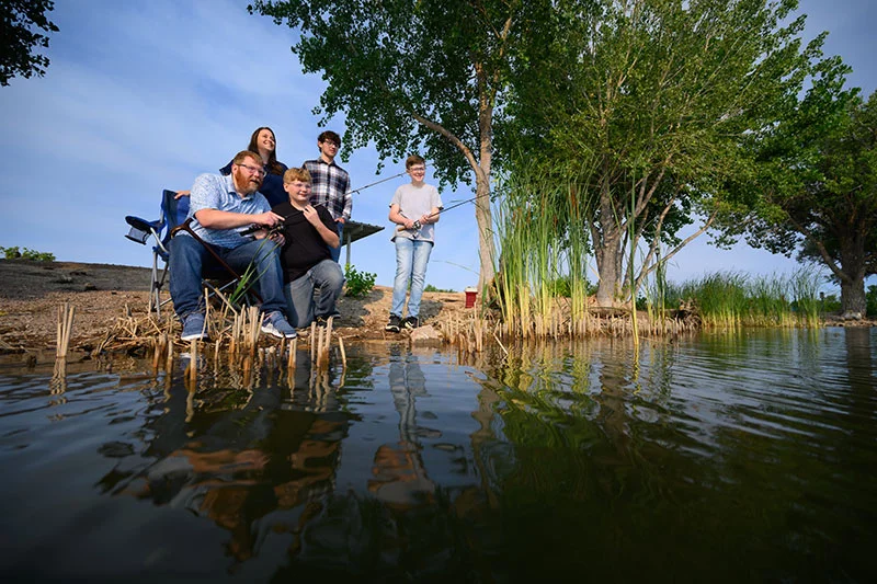John Mazanec and family fishing. John received a life-saving treatment after a motorcycle accident that saved his life. Paramedics gave him a whole-blood treatment in the ambulance on the way to the hospital.
