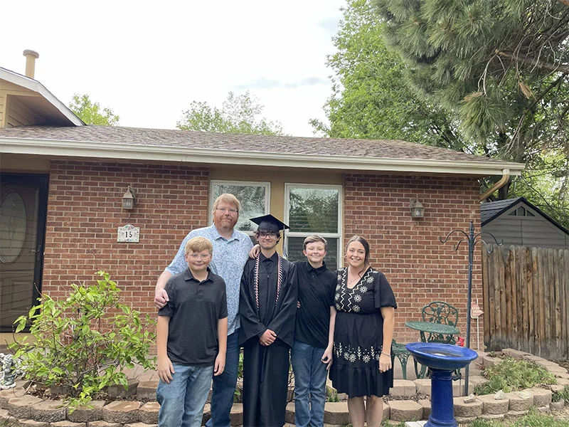 Family graduation photo. The Mazanec family celebrated James' high school graduation this spring. He plans to attend Pueblo Community College this fall to become a paramedic.