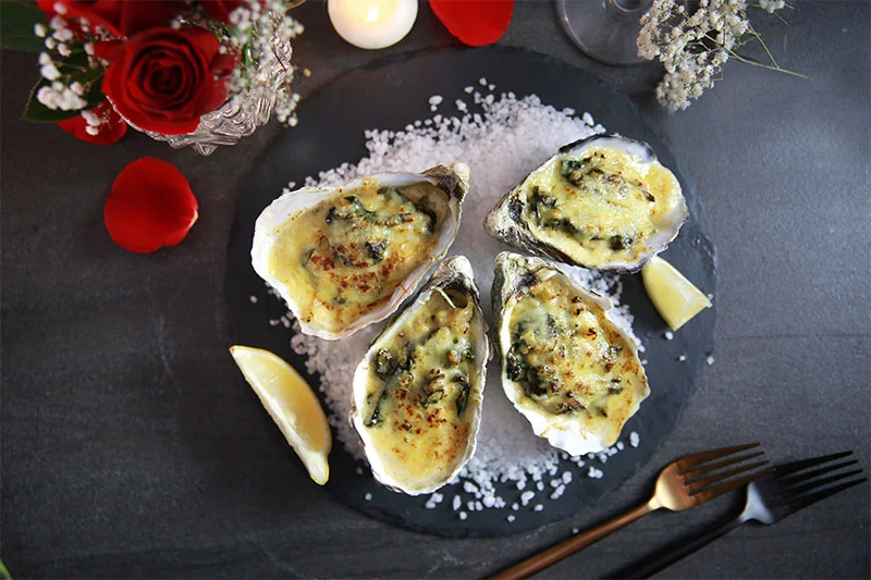 Oysters Rockefeller, pictured here, brings back a taste of America's oyster-loving past, when oysters were as common in Colorado dining rooms as they were on the coasts. Photo: Getty Images.