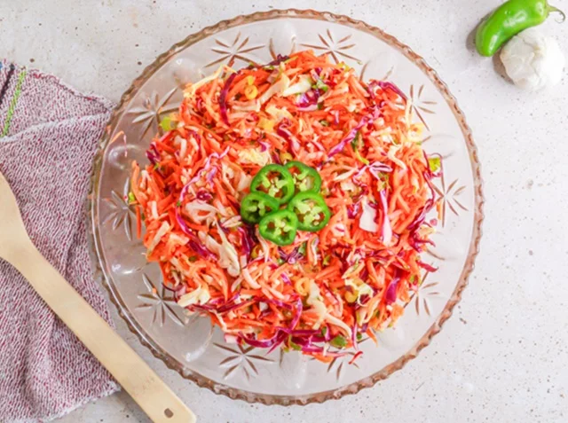 Fresh, colorful, and full of flavor, this recipe blends cabbage, carrots, and cilantro into a crisp slaw that is ideal for cooling down and enjoying the hot summer days. Photo: Gemma Aguayo-Murphy, for UCHealth.