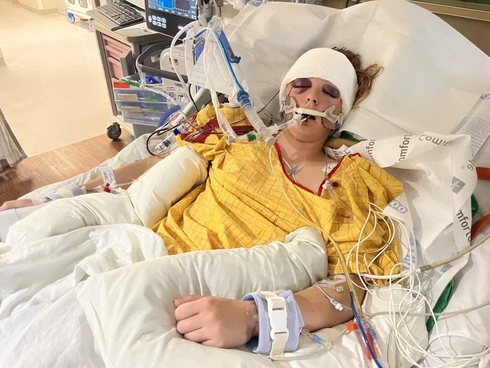 Kadyn in a hospital bed after the accident