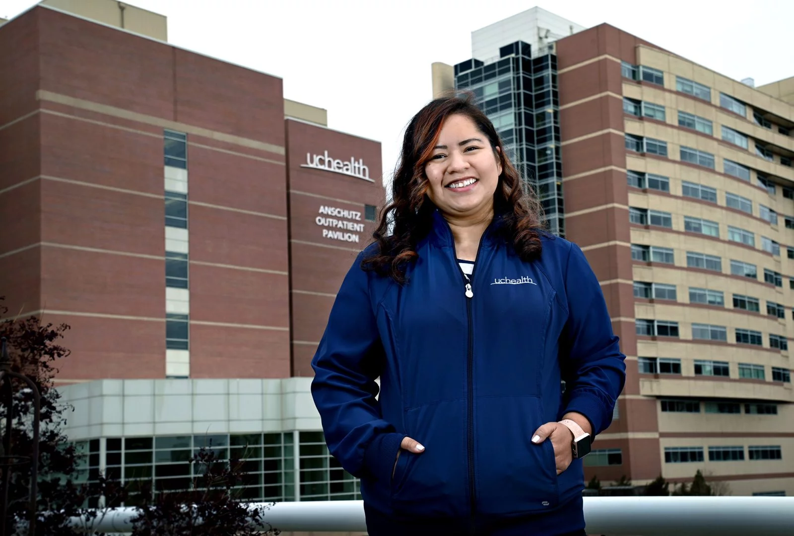 Etzany Diaz Ocampo stands outside of the UCHealth Anschutz Outpatient Pavilion