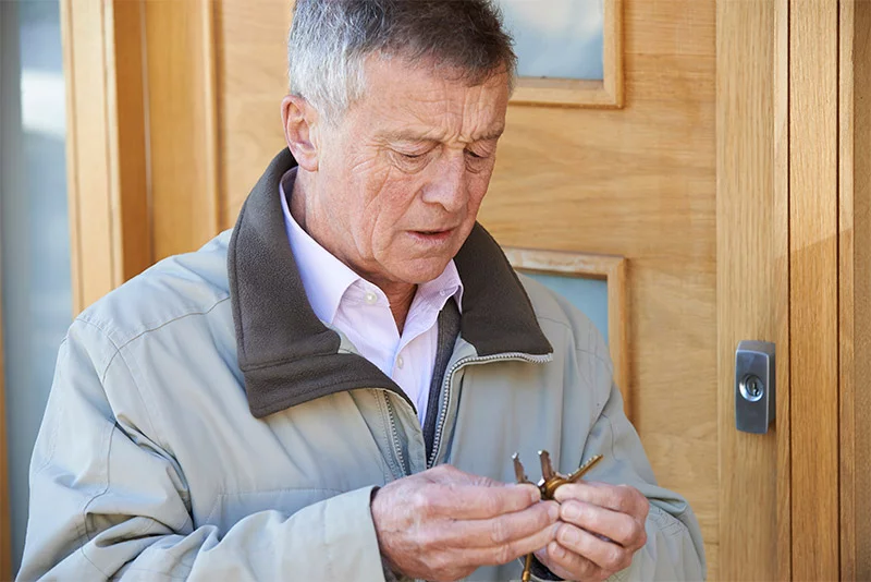 Man looking at his different keys, trying to remember which opens his door. As concern about memory loss grows, so do questions about what's normal and what isn't. Understanding who is at risk for cognitive decline, how to protect brain health and when memory changes warrant a conversation with a doctor can help people take steps to support long-term cognitive health. Photo: Getty Images.
