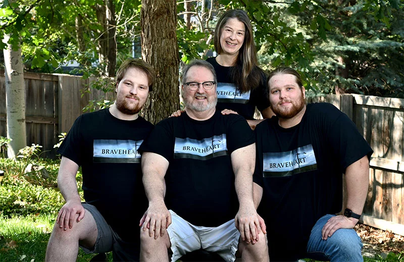 Left to right, Conor, Ted, Quinn and Kate D’Arcy in their backyard, in T-shirts the family created in support of Ted’s heart transplant surgery. Photo by Sonya Doctorian, UCHealth.