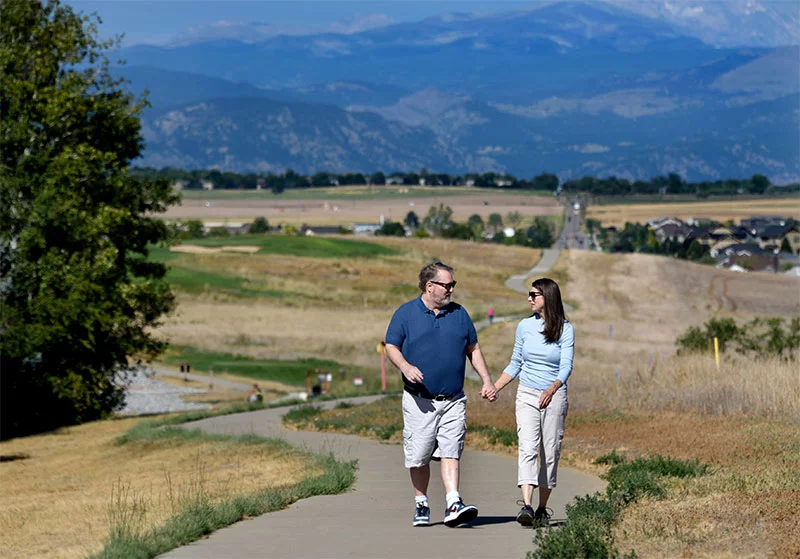 Ted and Kate D'Arcy take daily walks through open space behind their Weld County neighborhood. Photo by Sonya Doctorian, UCHealth.