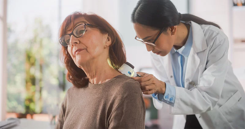 Older woman getting a skin check. An estimated 112,000 people in the United States will be diagnosed with melanoma this year, and more than 8,500 deaths are expected from the cancer's spread to other parts of the body. Photo: Getty Images.