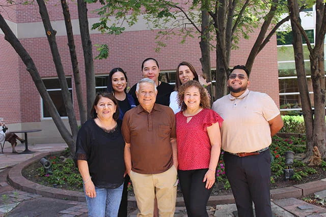 Ramon Cordoba and his wife, Maria (left), stand alongside members of the UCHealth Hispanic Transplant Program team. Photo: Ana Gretchen Robleto, UCHealth.
