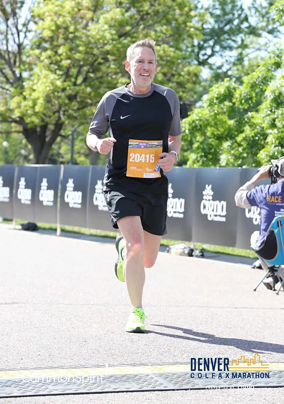 With scans every 90 days, Ross Camidge and his colleagues created a 90-day challenge that patients also use. The idea is simple. During the wait times between scans, choose something you've always wanted to do or have been putting off. For Camidge, that meant setting his sights on running in a 5K. It took two 90-day challenges, but Camidge reached his goal and competed in a 5K in Denver. Photo courtesy of Dr. Ross Camidge.