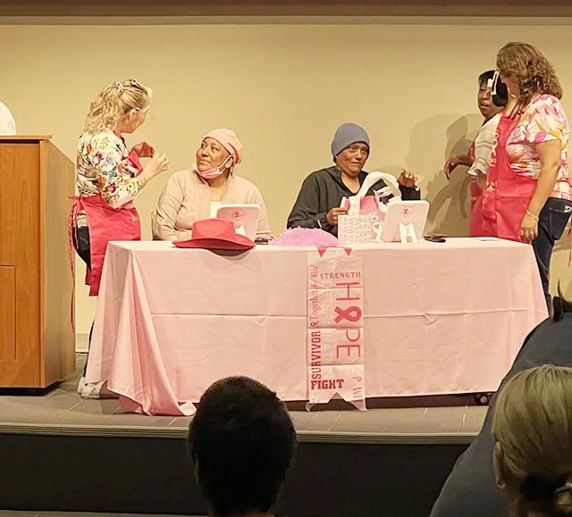 Volunteers come together at “Nadie Lucha Sola” events to foster connections among women who are undergoing cancer treatments, with services available both in English and Spanish. Photo courtesy of Ana Fauvet.