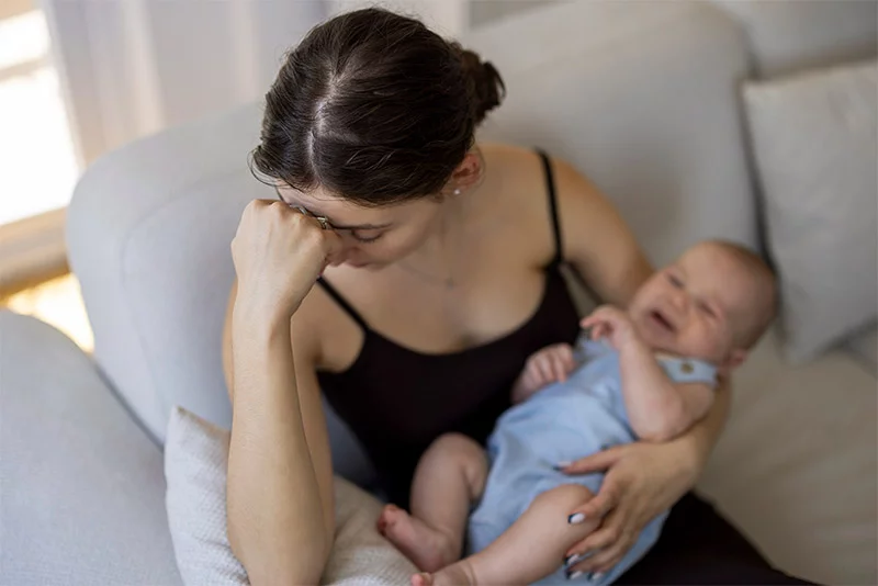 Postpartum depression affects about one in five mothers, while postpartum psychosis is less prevalent, affecting one to two women per 1,000 births. Both conditions require medical attention. Photo: Getty Images.