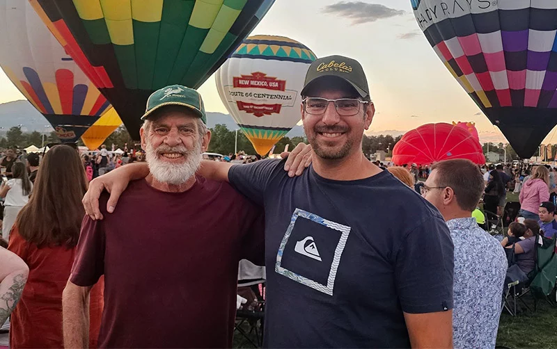 Willem "George" Erwee, left, with his son, Will Erwee. A retired electrician in Colorado Springs, George went in for a scan for rectal cancer and learned he had a dangerous abdominal aneurysm, which doctors quickly fixed. Photo courtesy of Will Erwee.