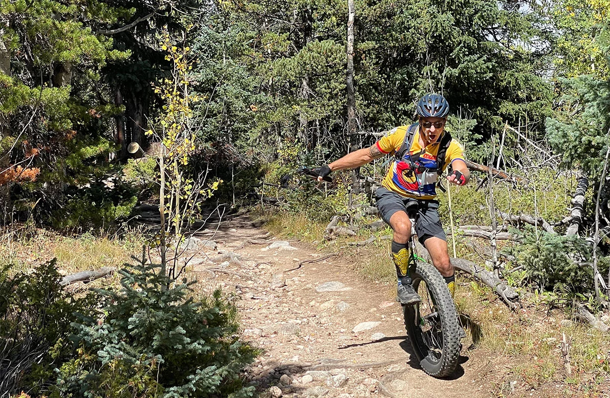 Mike Kalush keeps his balance on the Mule Deer Trail in Golden Gate Canyon State Park. Photo by Todd Neff, for UCHealth.